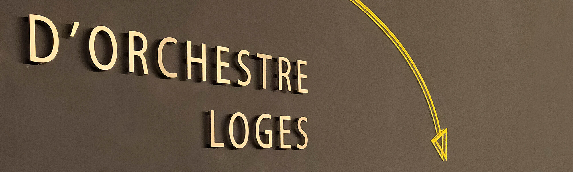 signage on the wall made of aluminum loose letters cut out